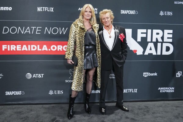 Penny Lancaster, left, and Rod Stewart arrive at the FireAid benefit concert on Thursday, Jan. 30, 2025, at Intuit Dome in Inglewood, Calif. (Photo by Jordan Strauss/Invision/AP)